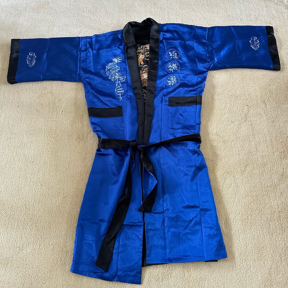 Beautiful royal blue/black reversible embroidered dragon robe.  Worn once!